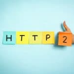 Website protocol HTTP:2 on blue background. Hand making thumb up gesture